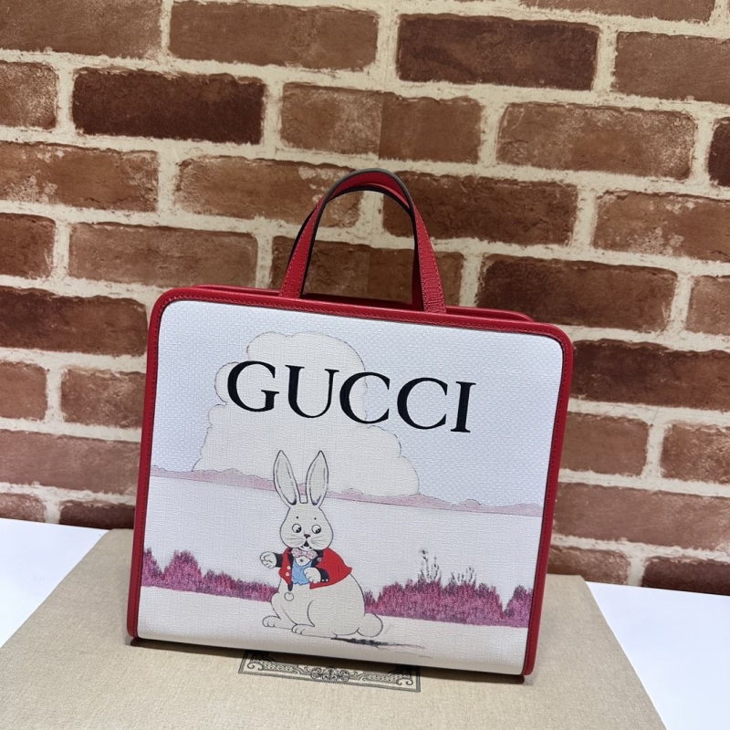 G*u*i shopping bags